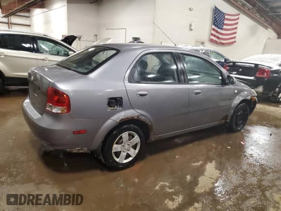 2006 Chevrolet Aveo LS z VIN KL1TD56646B553734, wystawiony jako Copart lot #88496205 z przebiegiem 156 610 mil mil oraz Czysty tytuł • Clean title. Historia ofert i sprzedaży dostępna na DreamBid. Obrazek 3.