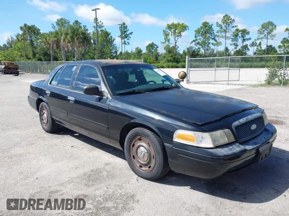 ✅ 2003 Ford Police Interceptor Street Appear • VIN: 2FAFP71W43X141540 • Lot: 43341761. Listed on IAAI with 101,636 mi. Free auction sales archive from the USA and detailed vehicle history report at DreamBid. Image 12.