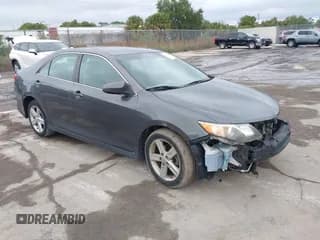 ✅ 2014 Toyota Camry SE • VIN: 4T1BF1FK0EU322428 • Lot: 43869586. Listed on IAAI with 146,671 mi. Free auction sales archive from the USA and detailed vehicle history report at DreamBid. Image 1.