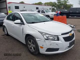✅ 2014 Chevrolet Cruze 1LT • VIN: 1G1PC5SB4E7477054 • Lot: 43185569. Listed on IAAI with 94,084 mi. Free auction sales archive from the USA and detailed vehicle history report at DreamBid. Image 1.