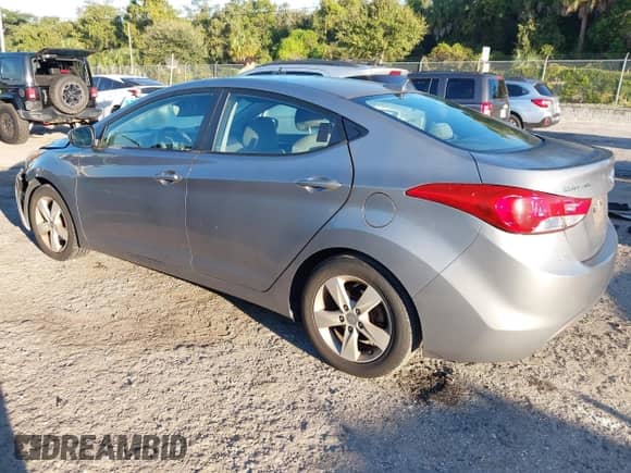 2013 Hyundai Elantra GLS z VIN KMHDH4AEXDU998342, wystawiony jako IAAI lot #43448219 z przebiegiem 168 229 mil mil oraz . Historia ofert i sprzedaży dostępna na DreamBid. Obrazek 3.