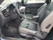 ✅ 2015 Volkswagen Beetle Fleet Edition • VIN: 3VWF17AT1FM609870 • Lot: 59155315. Listed on Copart with 145,425 mi. Free auction sales archive from the USA and detailed vehicle history report at DreamBid. Image 7.