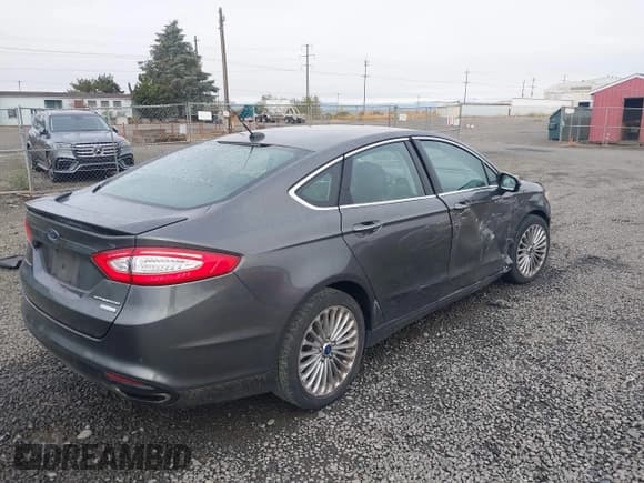 ✅ 2016 Ford Fusion Titanium • VIN: 3FA6P0K91GR248968 • Лот: 43181413. Опубликован ранее на IAAI с пробегом 126 692 миль. Бесплатный доступ к архиву аукционных продаж из США и подробный отчёт об истории автомобиля на DreamBid. Изображение 4.