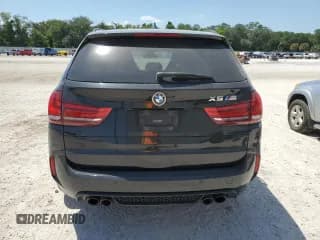 ✅ 2017 BMW X5 M • VIN: 5YMKT6C39H0U39418 • Lot: 51477644. Wystawiony na Copart z przebiegiem 93 127 mil. Bezpłatny archiwum sprzedaży aukcyjnych z USA i szczegółowy raport historii pojazdu na DreamBid. Zdjęcie 6.