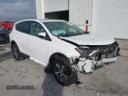 ✅ 2018 Toyota RAV4 XLE • VIN: 2T3WFREV2JW512910 • Lot: 42772049. Listed on IAAI with 138,019 mi. Free auction sales archive from the USA and detailed vehicle history report at DreamBid. Image 1.