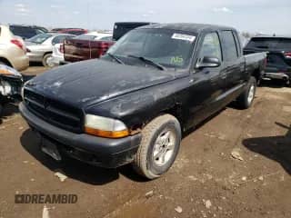 2002 Dodge Dakota Sport с VIN 1B7HL38N62S569437, выставлен на аукционе Copart как лот 50204334 с пробегом Не указан миль и Чистый • Clean title. История ставок и продаж доступна на DreamBid. Изображение 1.