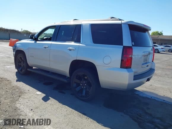 ✅ 2018 Chevrolet Tahoe LT • VIN: 1GNSKBKC4JR264509 • Lot: 42934249. Listed on IAAI with 99,372 mi. Free auction sales archive from the USA and detailed vehicle history report at DreamBid. Image 3.