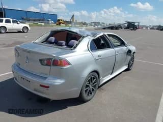 ✅ 2017 Mitsubishi Lancer ES • VIN: JA32U2FUXHU001520 • Lot: 42876560. Listed on IAAI with 69,290 mi. Free auction sales archive from the USA and detailed vehicle history report at DreamBid. Image 4.