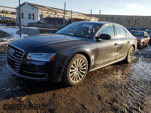 ✅ 2015 Audi A8 • VIN: WAUJGAFD4FN028750 • Lot: 89099265. Listed on Copart with 44,149 mi. Free auction sales archive from the USA and detailed vehicle history report at DreamBid. Image 1.