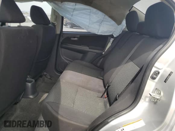 ✅ 2013 Suzuki SX4 LE • VIN: JS2YC5A35D6101897 • Лот: 62202315. Опубликован ранее на Copart с пробегом 120 532 миль. Бесплатный доступ к архиву аукционных продаж из США и подробный отчёт об истории автомобиля на DreamBid. Изображение 10.