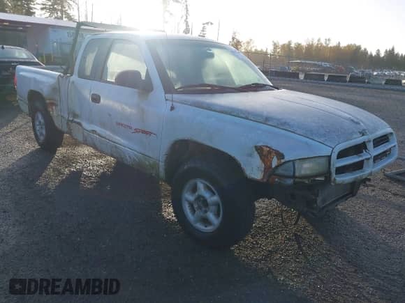 1998 Dodge Dakota SLT with VIN 1B7GL22X6WS766159, listed as a IAAI auction lot 43527309 with 222,104 mi miles and . Bid and sale history available at DreamBid. Image 1.