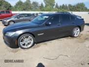 ✅ 2014 BMW 7 Series 750i xDrive • VIN: WBAYB6C54ED224456 • Lot: 71027795. Listed on Copart with 104,442 mi. Free auction sales archive from the USA and detailed vehicle history report at DreamBid. Image 1.