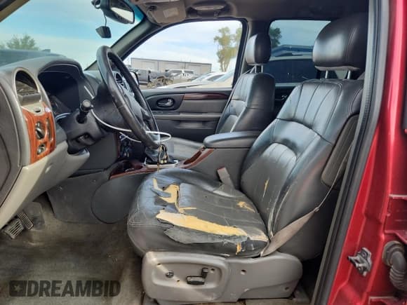 ✅ 2002 GMC Envoy SLT • VIN: 1GKDS13S422128705 • Lot: 81436985. Wystawiony na Copart z przebiegiem 231 758 mil. Bezpłatny archiwum sprzedaży aukcyjnych z USA i szczegółowy raport historii pojazdu na DreamBid. Zdjęcie 7.