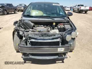 2015 Chevrolet Sonic LT с VIN 1G1JC5SH9F4132342, выставлен на аукционе Copart как лот 69644234 с пробегом 123 087 миль миль и Списание • Salvage title. История ставок и продаж доступна на DreamBid. Изображение 5.