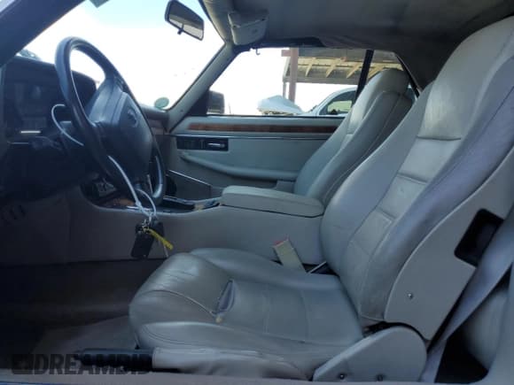 ✅ 1995 Jaguar XJS • VIN: SAJNX2746SC221871 • Lot: 69617935. Listed on Copart with 85,797 mi. Free auction sales archive from the USA and detailed vehicle history report at DreamBid. Image 7.