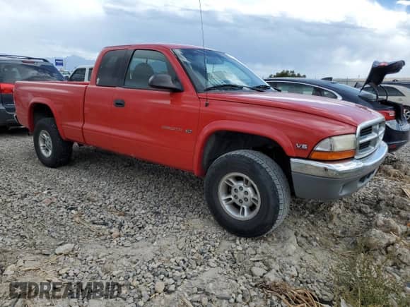 1999 Dodge Dakota SLT z VIN 1B7GG22X7XS101535, wystawiony jako Copart lot #71592334 z przebiegiem 151 644 mil mil oraz Szkoda całkowita • Salvage title. Historia ofert i sprzedaży dostępna na DreamBid. Obrazek 4.