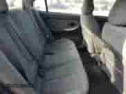 2003 Hyundai Elantra GLS z VIN KMHDN45DX3U590030, wystawiony jako Copart lot #69869194 z przebiegiem 161 175 mil mil oraz Czysty tytuł • Clean title. Historia ofert i sprzedaży dostępna na DreamBid. Obrazek 10.