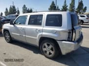 ✅ 2010 Jeep Patriot Latitude • VIN: 1J4NT1GB7AD677299 • Lot: 91133015. Listed on Copart with 144,641 mi. Free auction sales archive from the USA and detailed vehicle history report at DreamBid. Image 2.
