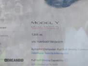 ✅ 2025 Tesla Model Y Performance • VIN: 7SAYGDEF7SF261071 • Lot: 42738857. Listed on IAAI with 7,305 mi. Free auction sales archive from the USA and detailed vehicle history report at DreamBid. Image 7.