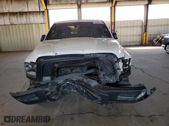 2021 Ram 1500 Warlock z VIN 1C6RR6GT6MS500553, wystawiony jako Copart lot #67321215 z przebiegiem Nie podano mil oraz Szkoda całkowita • Salvage title. Historia ofert i sprzedaży dostępna na DreamBid. Obrazek 5.