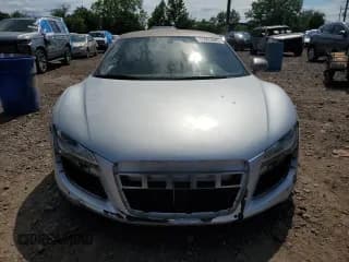 ✅ 2009 Audi R8 4.2L • VIN: WUAAU34219N002803 • Lot: 65063885. Wystawiony na Copart z przebiegiem 62 833 mil. Bezpłatny archiwum sprzedaży aukcyjnych z USA i szczegółowy raport historii pojazdu na DreamBid. Zdjęcie 5.
