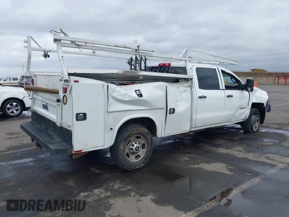 ✅ 2016 Chevrolet Silverado 2500HD Work Truck • VIN: 1GC1CUEG2GF102108 • Lot: 43471361. Listed on IAAI with 185,168 mi. Free auction sales archive from the USA and detailed vehicle history report at DreamBid. Image 4.