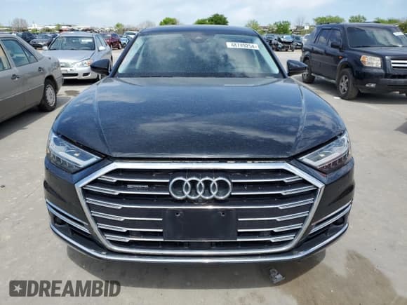 ✅ 2019 Audi A8 • VIN: WAU8EAF88KN024329 • Лот: 48749254. Опубликован ранее на Copart с пробегом 31 721 миль. Бесплатный доступ к архиву аукционных продаж из США и подробный отчёт об истории автомобиля на DreamBid. Изображение 5.
