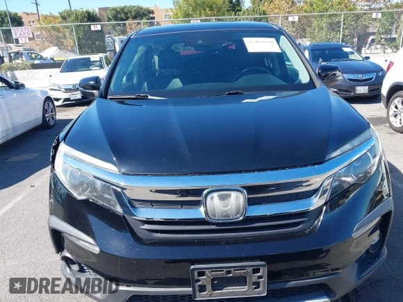 ✅ 2020 Honda Pilot EX-L • VIN: 5FNYF5H59LB023989 • Lot: 43483678. Wystawiony na IAAI z przebiegiem 76 111 mil. Bezpłatny archiwum sprzedaży aukcyjnych z USA i szczegółowy raport historii pojazdu na DreamBid. Zdjęcie 12.