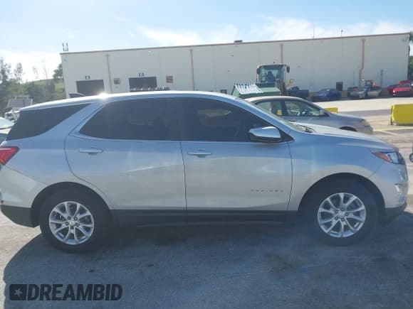 ✅ 2021 Chevrolet Equinox LT • VIN: 2GNAXKEV4M6102860 • Lot: 43678274. Listed on IAAI with 92,118 mi. Free auction sales archive from the USA and detailed vehicle history report at DreamBid. Image 13.
