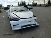 ✅ 2022 Tesla Model 3 • VIN: 5YJ3E1EA5NF349475 • Lot: 86544605. Listed on Copart with 62,345 mi. Free auction sales archive from the USA and detailed vehicle history report at DreamBid. Image 13.