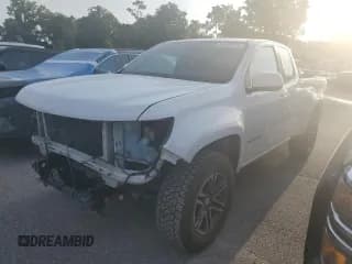 ✅ 2021 Chevrolet Colorado 2WD Work Truck • VIN: 1GCHSBEA2M1208553 • Лот: 63029544. Опубликован ранее на Copart с пробегом 100 094 миль. Бесплатный доступ к архиву аукционных продаж из США и подробный отчёт об истории автомобиля на DreamBid. Изображение 1.