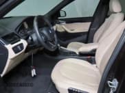 ✅ 2018 BMW X1 sDrive28i • VIN: WBXHU7C37J5L05511 • Lot: 85006215. Listed on Copart with 25,925 mi. Free auction sales archive from the USA and detailed vehicle history report at DreamBid. Image 9.