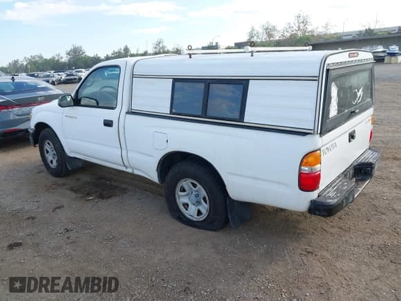 ✅ 2002 Toyota Tacoma • VIN: 5TENL42NX2Z129931 • Lot: 43503448. Listed on IAAI with 195,702 mi. Free auction sales archive from the USA and detailed vehicle history report at DreamBid. Image 3.