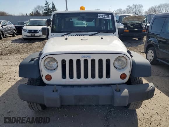 ✅ 2008 Jeep Wrangler X • VIN: 1J4FZ24128L612526 • Лот: 49152275. Опубликован ранее на Copart с пробегом 128 584 миль. Бесплатный доступ к архиву аукционных продаж из США и подробный отчёт об истории автомобиля на DreamBid. Изображение 5.