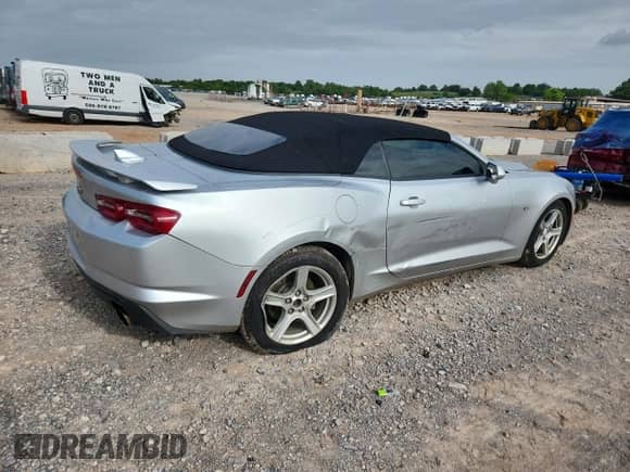 2019 Chevrolet Camaro 1LT с VIN 1G1FB3DX1K0114288, выставлен на аукционе Copart как лот 63510685 с пробегом 99 159 миль миль и Списание • Salvage title. История ставок и продаж доступна на DreamBid. Изображение 3.