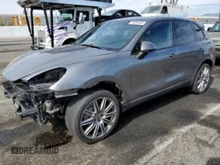 ✅ 2012 Porsche Cayenne S Hybrid • VIN: WP1AE2A21CLA91671 • Лот: 70204925. Опубликован ранее на Copart с пробегом 71 203 миль. Бесплатный доступ к архиву аукционных продаж из США и подробный отчёт об истории автомобиля на DreamBid. Изображение 1.