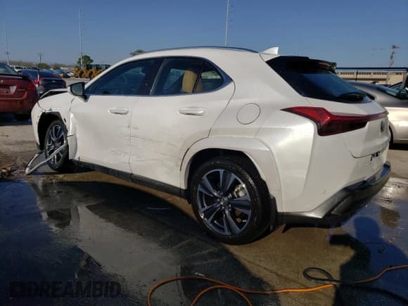 ✅ 2023 Lexus UX 250h Premium • VIN: JTHP6JBH1P2155482 • Lot: 43635054. Listed on Copart with 15,552 mi. Free auction sales archive from the USA and detailed vehicle history report at DreamBid. Image 2.