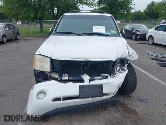 ✅ 2006 GMC Envoy SLE • VIN: 1GKDT13S762251921 • Lot: 42460295. Listed on IAAI with 206,063 mi. Free auction sales archive from the USA and detailed vehicle history report at DreamBid. Image 12.