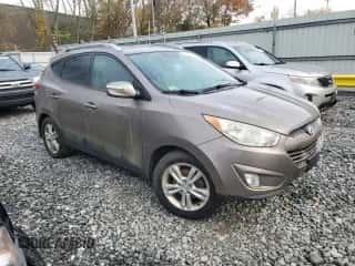 2013 Hyundai Tucson GLS z VIN KM8JUCAC5DU564904, wystawiony jako Copart lot #91123035 z przebiegiem 171 088 mil mil oraz Czysty tytuł • Clean title. Historia ofert i sprzedaży dostępna na DreamBid. Obrazek 4.