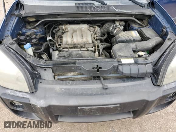 2007 Hyundai Tucson SE with VIN KM8JN72D47U526922, listed as a Copart auction lot 58834145 with 191,302 mi miles and Salvage title. Bid and sale history available at DreamBid. Image 12.