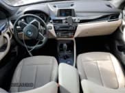 ✅ 2018 BMW X1 xDrive28i • VIN: WBXHT3C35J5L34453 • Lot: 90613065. Listed on Copart with 100,736 mi. Free auction sales archive from the USA and detailed vehicle history report at DreamBid. Image 8.