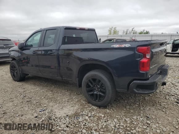 ✅ 2023 Chevrolet Silverado 1500 Custom • VIN: 1GCRDBEK6PZ281874 • Lot: 57346795. Listed on Copart with 43,285 mi. Free auction sales archive from the USA and detailed vehicle history report at DreamBid. Image 2.