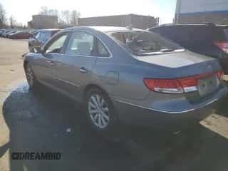 2009 Hyundai Azera GLS z VIN KMHFC46D69A372965, wystawiony jako Copart lot #79397374 z przebiegiem 106 207 mil mil oraz Szkoda całkowita • Salvage title. Historia ofert i sprzedaży dostępna na DreamBid. Obrazek 2.