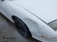 ✅ 1996 Pontiac Sunfire SE • VIN: 1G2JB5247T7565776 • Lot: 41560112. Listed on IAAI with 73,286 mi. Free auction sales archive from the USA and detailed vehicle history report at DreamBid. Image 6.