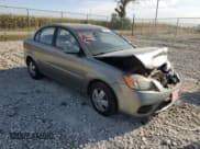 ✅ 2011 Kia Rio LX • VIN: KNADH4A35B6912839 • Lot: 72138064. Listed on Copart with 111,523 mi. Free auction sales archive from the USA and detailed vehicle history report at DreamBid. Image 4.