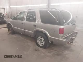 ✅ 2003 Chevrolet Blazer LS • VIN: 1GNDT13X43K132959 • Lot: 42629519. Wystawiony na IAAI z przebiegiem 87 027 mil. Bezpłatny archiwum sprzedaży aukcyjnych z USA i szczegółowy raport historii pojazdu na DreamBid. Zdjęcie 3.
