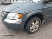 ✅ 2005 Dodge Caravan SXT • VIN: 2D4GP44L05R435073 • Lot: 43633448. Wystawiony na IAAI z przebiegiem 359 537 mil. Bezpłatny archiwum sprzedaży aukcyjnych z USA i szczegółowy raport historii pojazdu na DreamBid. Zdjęcie 6.