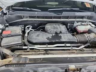 2021 Chevrolet Silverado 1500 Custom z VIN 1GCPWBEK1MZ261562, wystawiony jako IAAI lot #42304777 z przebiegiem 112 540 mil mil oraz . Historia ofert i sprzedaży dostępna na DreamBid. Obrazek 1.