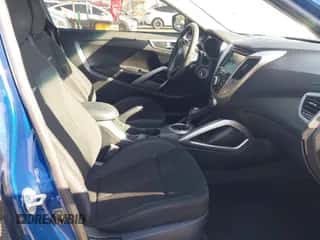 2016 Hyundai Veloster z VIN KMHTC6AD2GU269821, wystawiony jako IAAI lot #43365820 z przebiegiem 170 376 mil mil oraz . Historia ofert i sprzedaży dostępna na DreamBid. Obrazek 5.