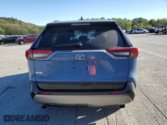 ✅ 2022 Toyota RAV4 Hybrid XSE • VIN: 2T3E6RFV8NW030197 • Лот: 81999085. Опубликован ранее на Copart с пробегом 64 825 миль. Бесплатный доступ к архиву аукционных продаж из США и подробный отчёт об истории автомобиля на DreamBid. Изображение 6.